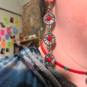 Red and green dangle earrings